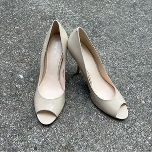 new nine west opened toed nude pumps 
size 10